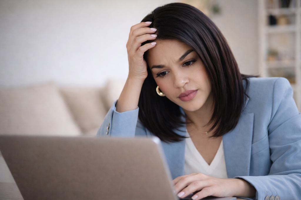 Woman working on a laptop with ADHD and Executive Dysfunction